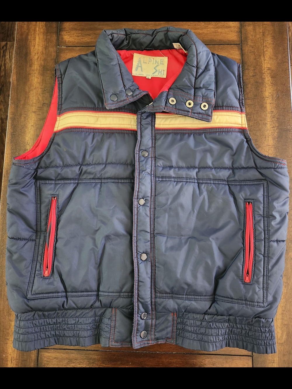 Alpine Navy Puffer Vest with Red Lining and Cream Stripe